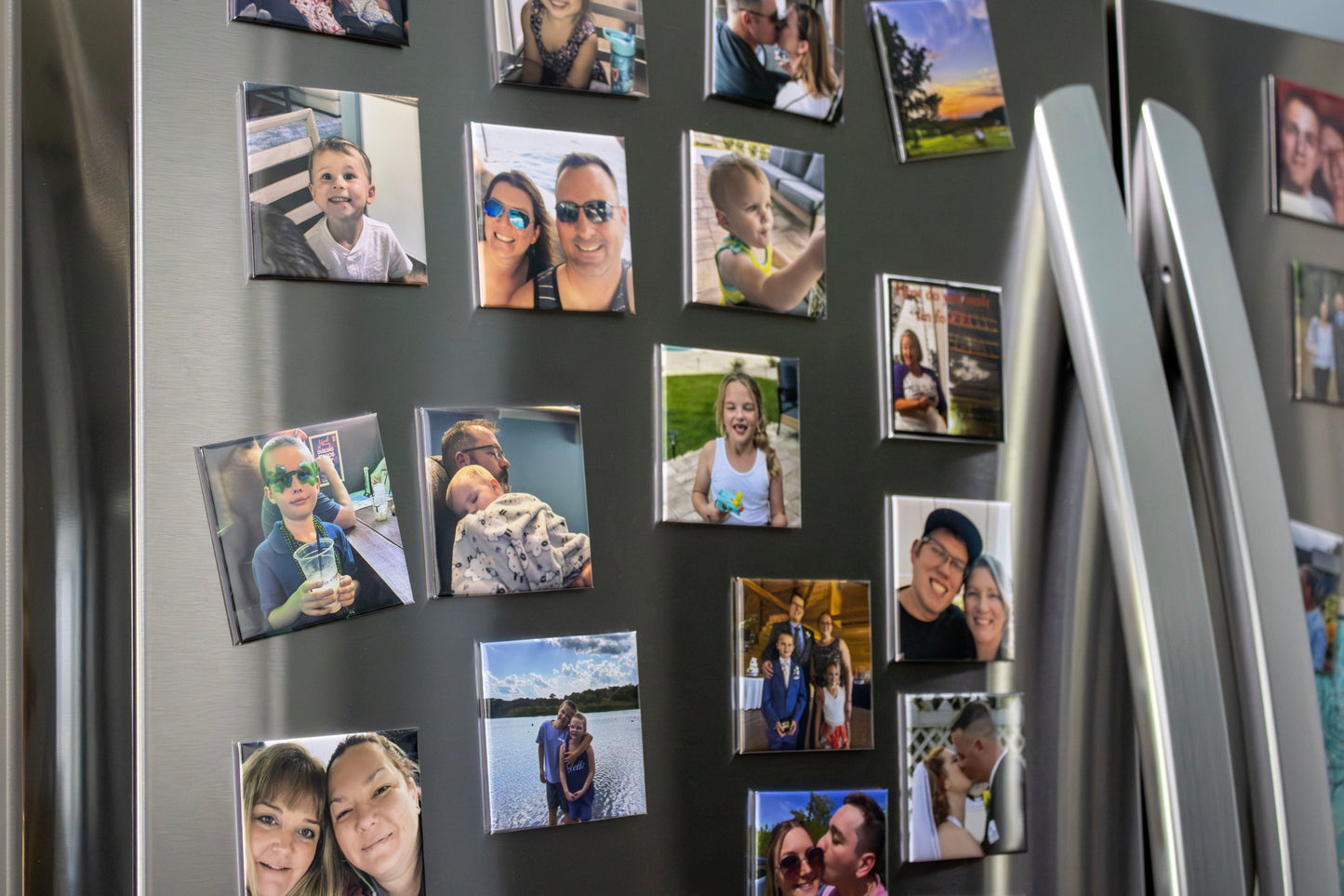 Fridge with various family photos attached as magnets